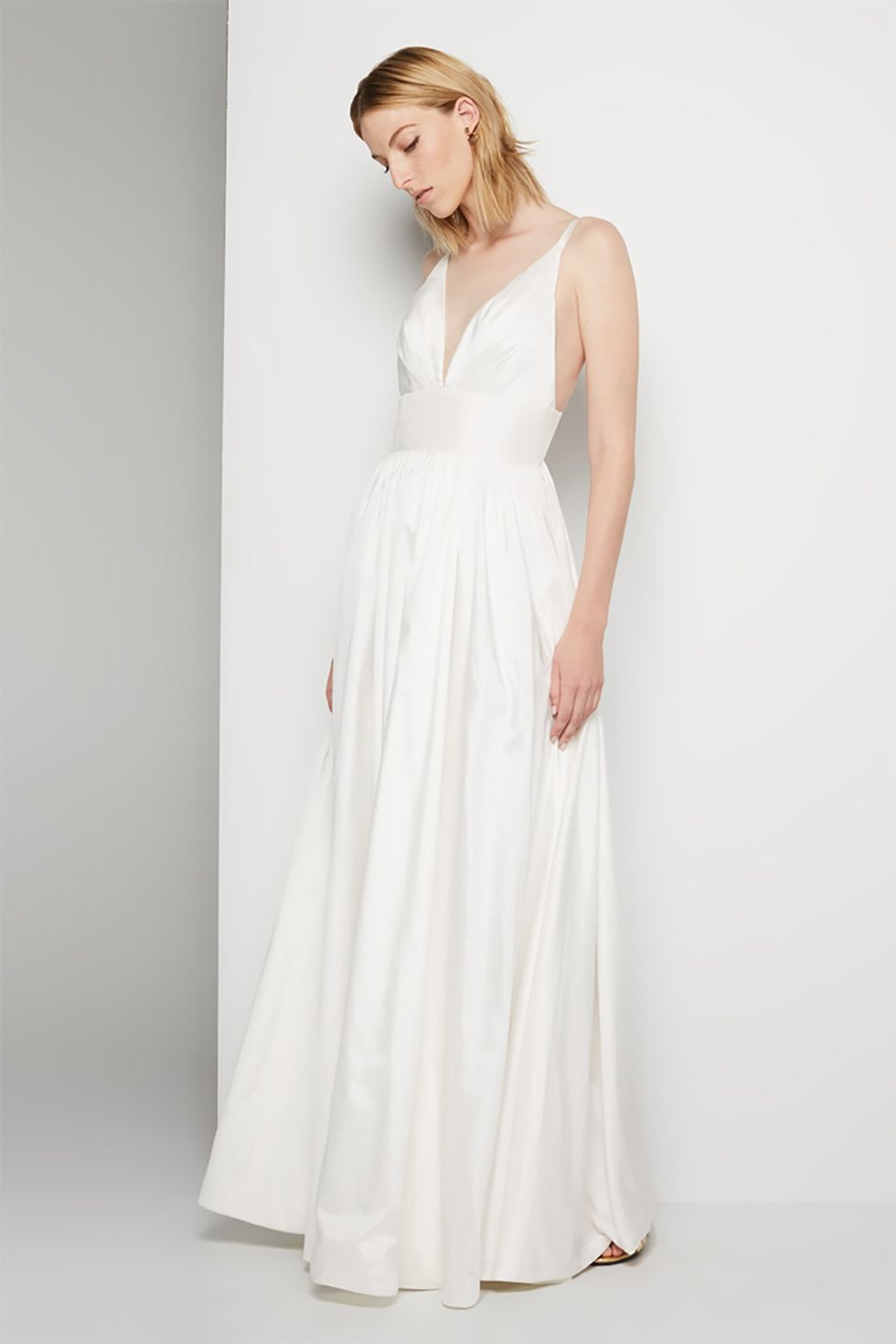 <p>You might've looked into the online retailer because they let you pick out colors and customize necklines and skirts. They do that for their newly launched wedding category too, which includes this ultra-flattering spaghetti-strap number.&nbsp;</p><p>$239, <a href="https://www.fameandpartners.com/dresses/dress-astrid-814?color=white" target="_blank" data-tracking-id="recirc-text-link">fameandpartners.com</a>.</p>