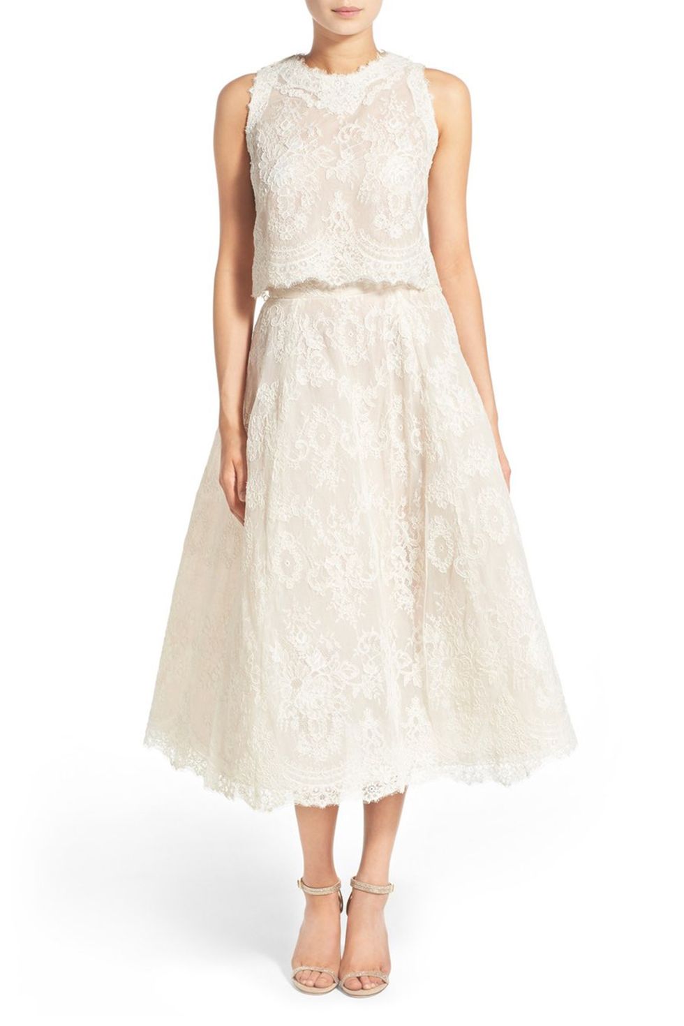 <p>Everybody likes a two-fer, and everybody likes an Audrey Hepburn reference even more.&nbsp;</p><p>$2,208, <a href="http://shop.nordstrom.com/s/embrdrd-lace-crop-top-skirt/4247466?origin=category-personalizedsort&amp;fashioncolor=SILK%20WHITE%2F%20NUDE" target="_blank" data-tracking-id="recirc-text-link">shop.nordstrom.com</a>.</p>