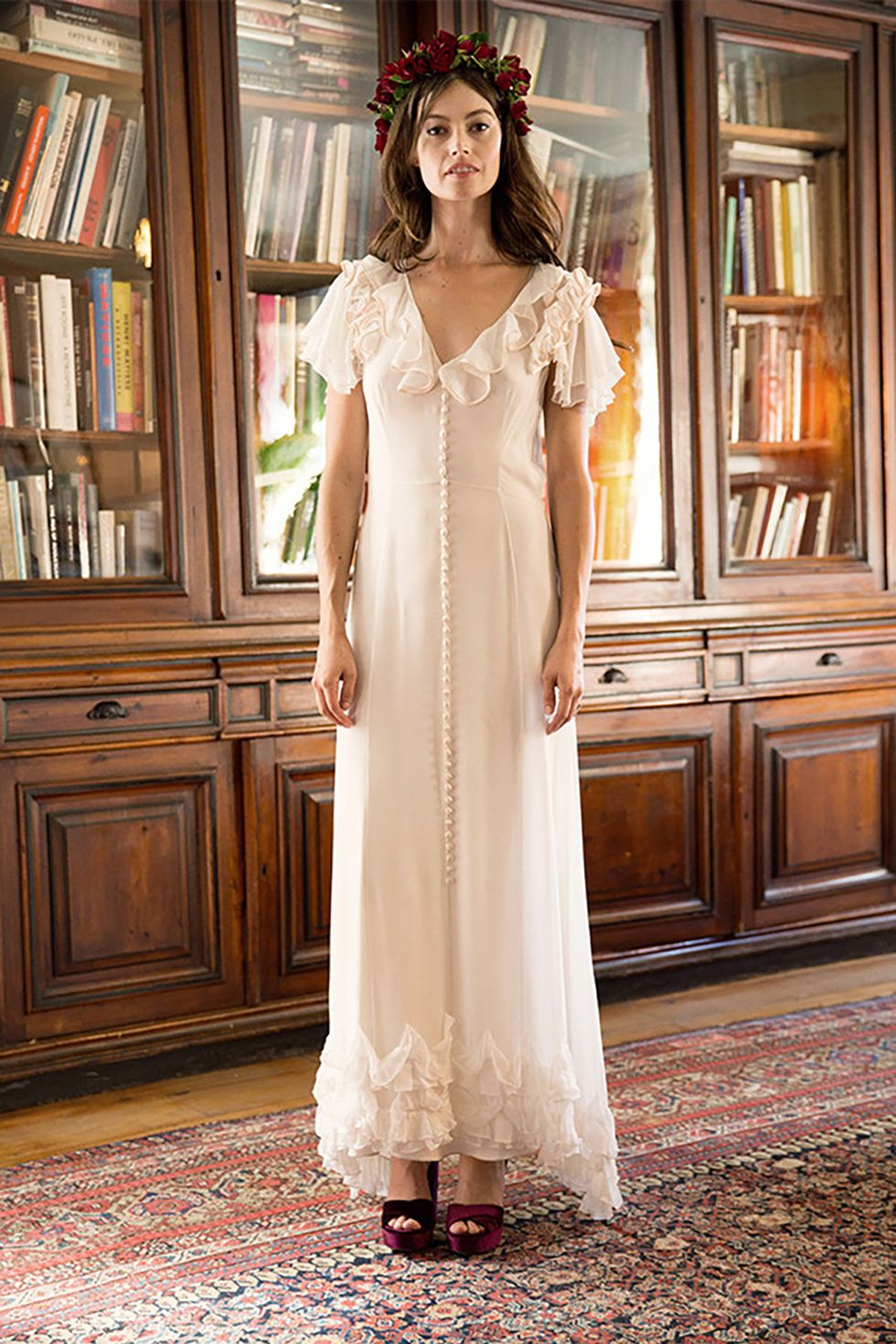 <p>If your aesthetic skews more boho, Stone Fox Bride&nbsp;= the first place you hit up after you call City Hall. Bonus: This ruffly guy could 100 percent be re-worn in the summer.&nbsp;</p><p>$4,600, <a href="https://stonefoxbride.com/products/sheer-silk-ruffle-wedding-dress" target="_blank" data-tracking-id="recirc-text-link">stonefoxbride.com</a>.</p>