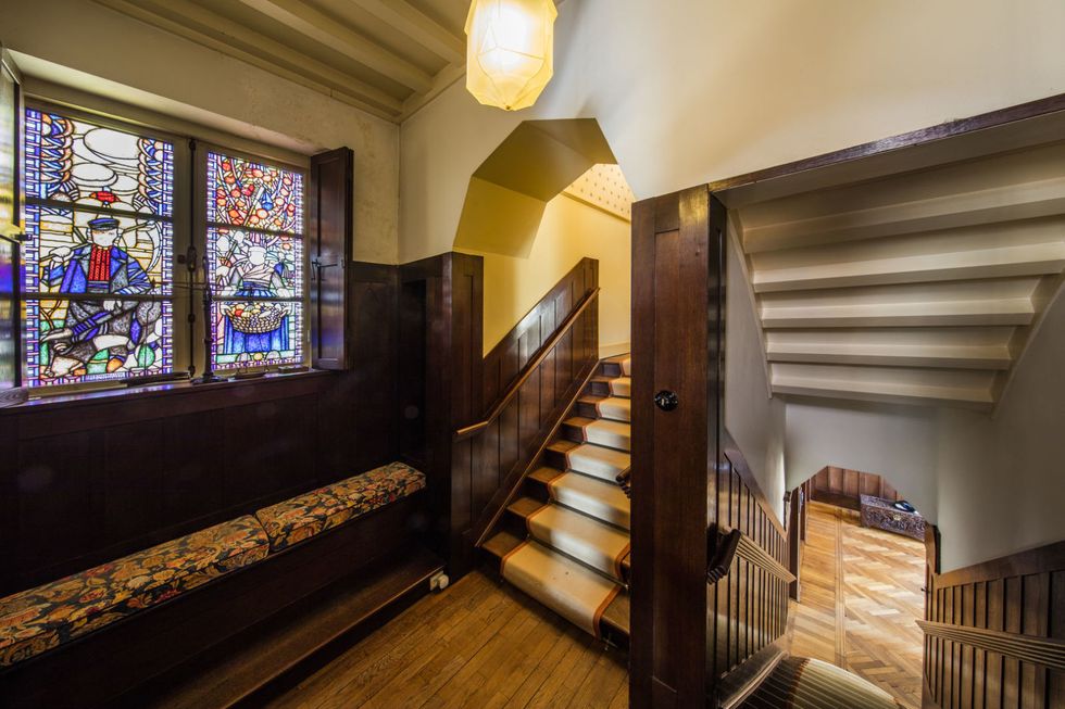 Lighting, Stairs, Interior design, Wood, Stained glass, Glass, Room, Floor, Ceiling, Hardwood, 