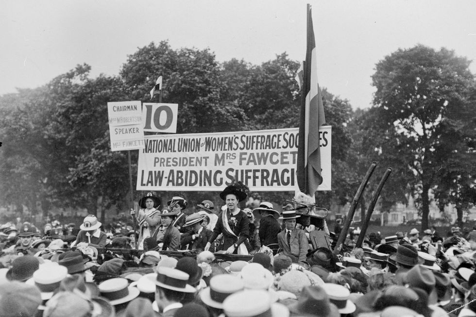 People, Crowd, Hat, Headgear, Protest, Sun hat, Public event, Flag, Monochrome, Cowboy hat, 