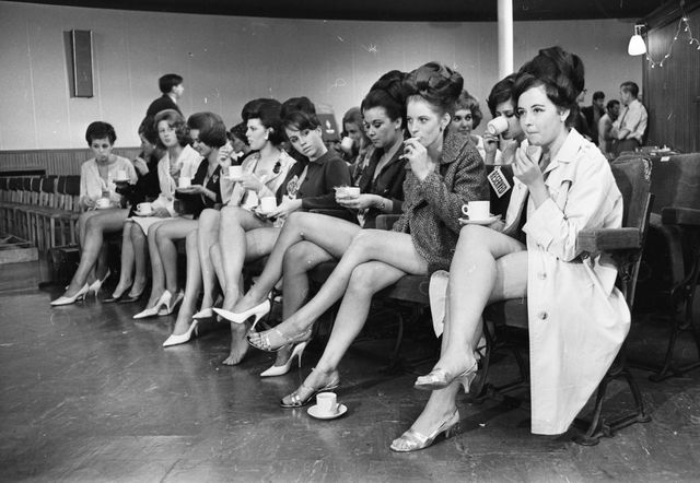 Leg, People, Social group, Monochrome, Photograph, Human leg, Style, Sitting, Black-and-white, Crowd, 