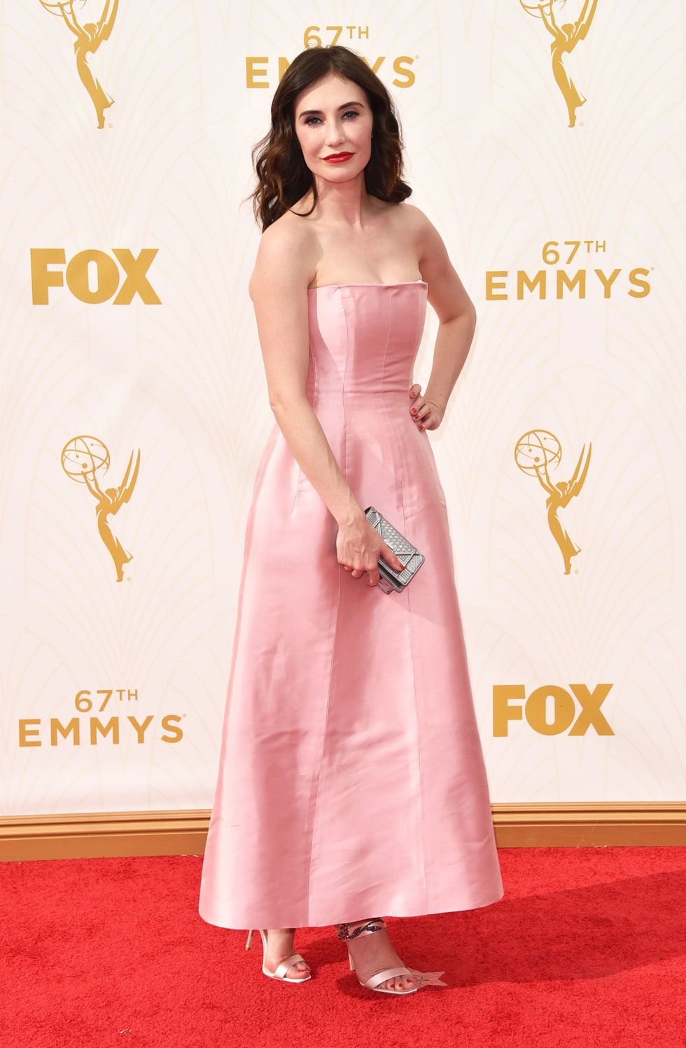 Red carpet, Clothing, Dress, Carpet, Pink, Shoulder, Strapless dress, Flooring, Hairstyle, Gown, 