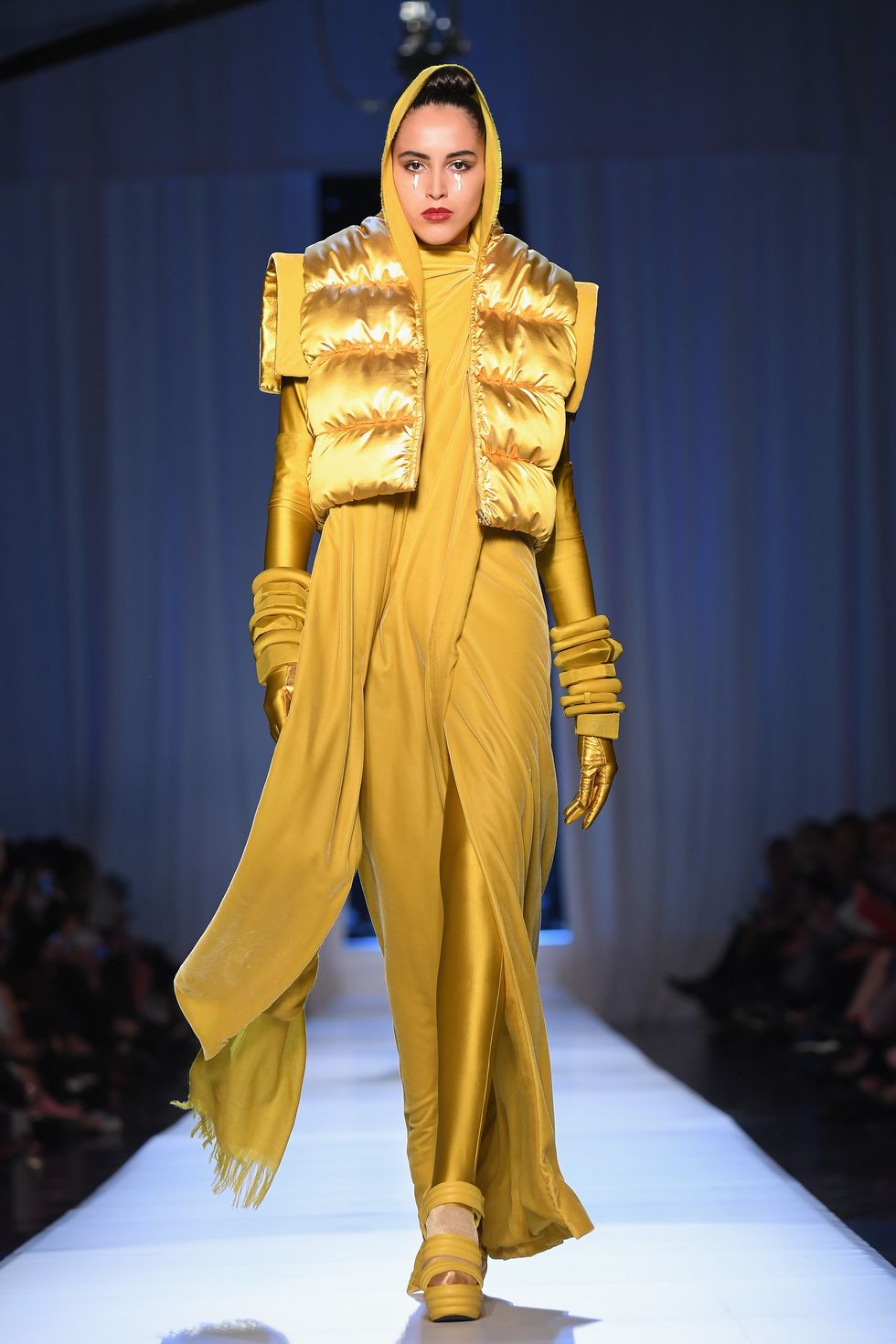 Fashion model, Fashion, Fashion show, Clothing, Yellow, Runway, Fashion design, Model, Outerwear, Event, 