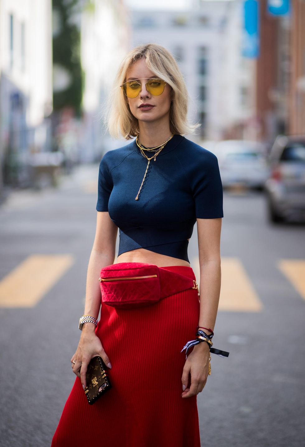Sleeve, Shoulder, Sunglasses, Fashion accessory, Joint, Red, Style, Street fashion, Waist, Jewellery, 