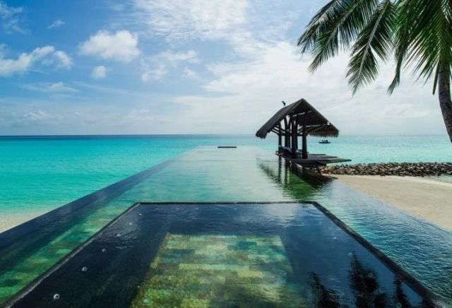 Sky, Tropics, Ocean, Sea, Vacation, Resort, Turquoise, Palm tree, Swimming pool, Tree, 