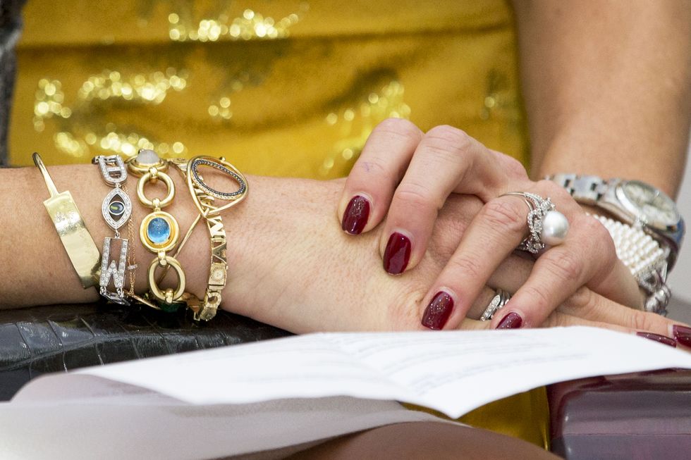 Nail, Finger, Hand, Jewellery, Wrist, Yellow, Fashion accessory, Close-up, Design, Pattern, 