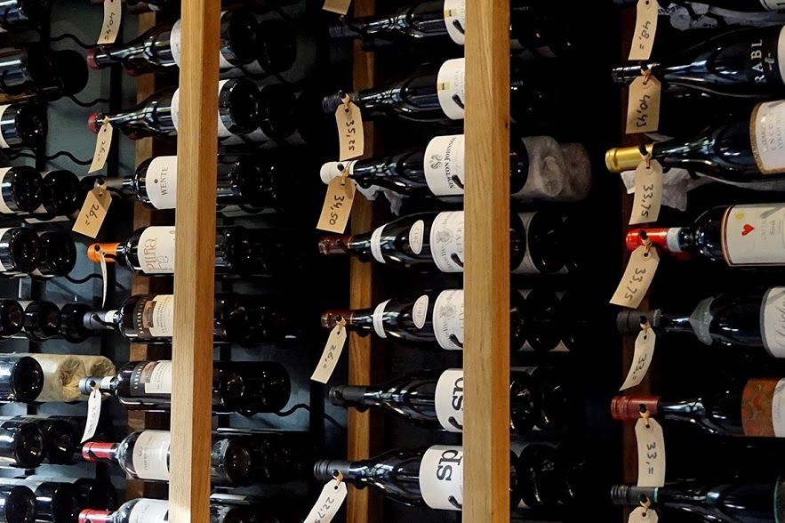 Wine, Wine cellar, Wine rack, Wine bottle, Winery, Bottle, Liquor store, Drink, Furniture, Inventory, 