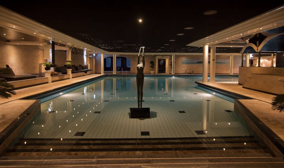 Swimming pool, Building, Property, Lighting, Leisure centre, Architecture, Leisure, Real estate, Interior design, Home, 
