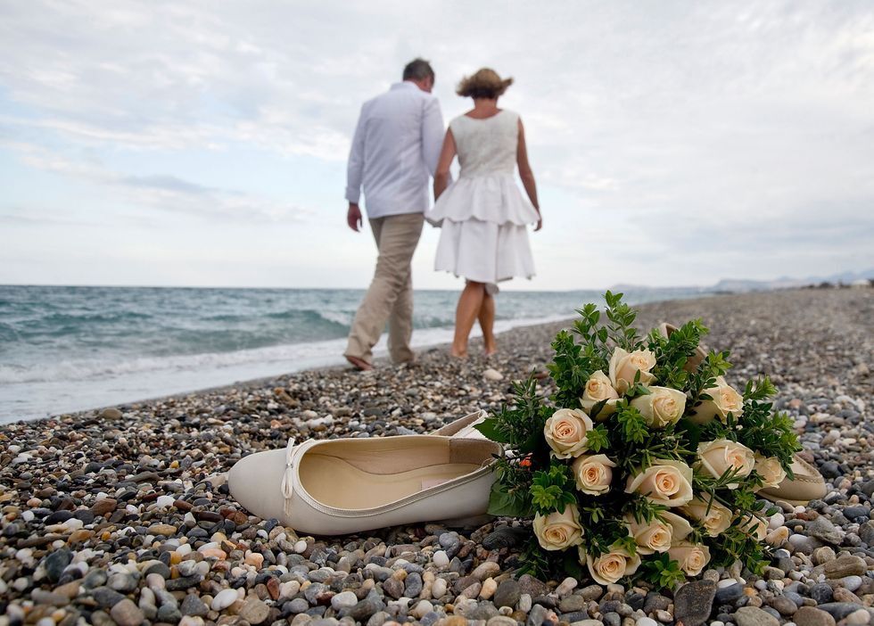 Petal, Dress, Flower, People in nature, Interaction, Shore, Honeymoon, Romance, Love, People on beach, 