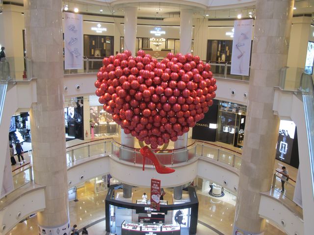 Lighting, Architecture, Red, Interior design, Ceiling, Party supply, Retail, Balloon, Shopping mall, Service, 