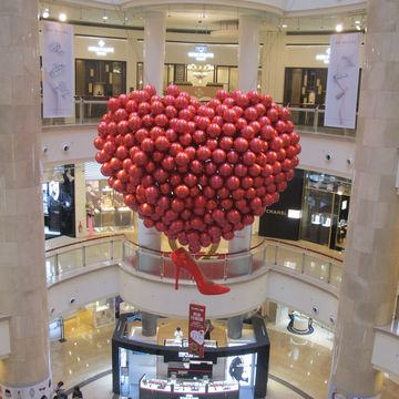 Lighting, Architecture, Red, Interior design, Ceiling, Party supply, Retail, Balloon, Shopping mall, Service, 