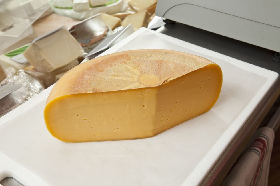Food, Ingredient, Tan, Cheese, Toma cheese, Dish, Processed cheese, Plate, Dishware, Sheep milk cheese, 