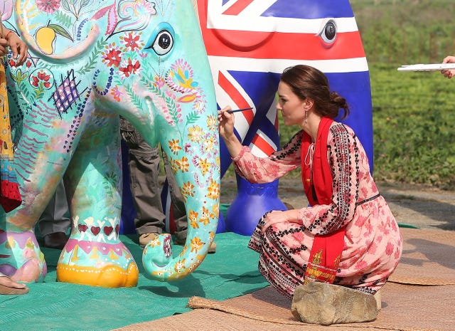 Elephant, Elephants and Mammoths, Human, Indian elephant, Airplane, Aircraft, Artist, Aviation, Temple, Air travel, 