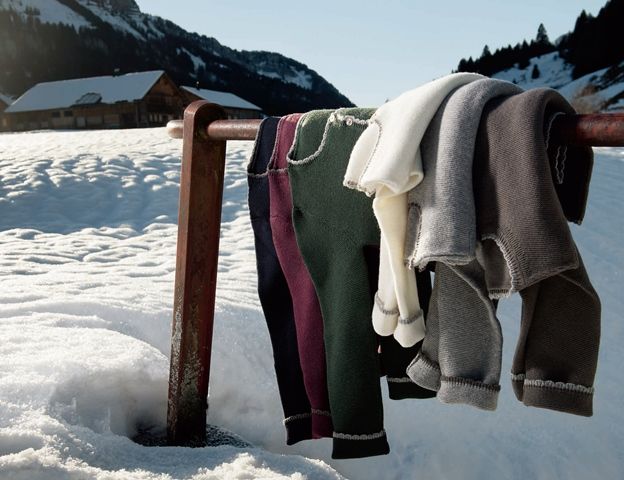 Winter, Textile, Snow, Freezing, Mountain range, Hill station, Sweater, Glacial landform, Clothes hanger, Ice cap, 