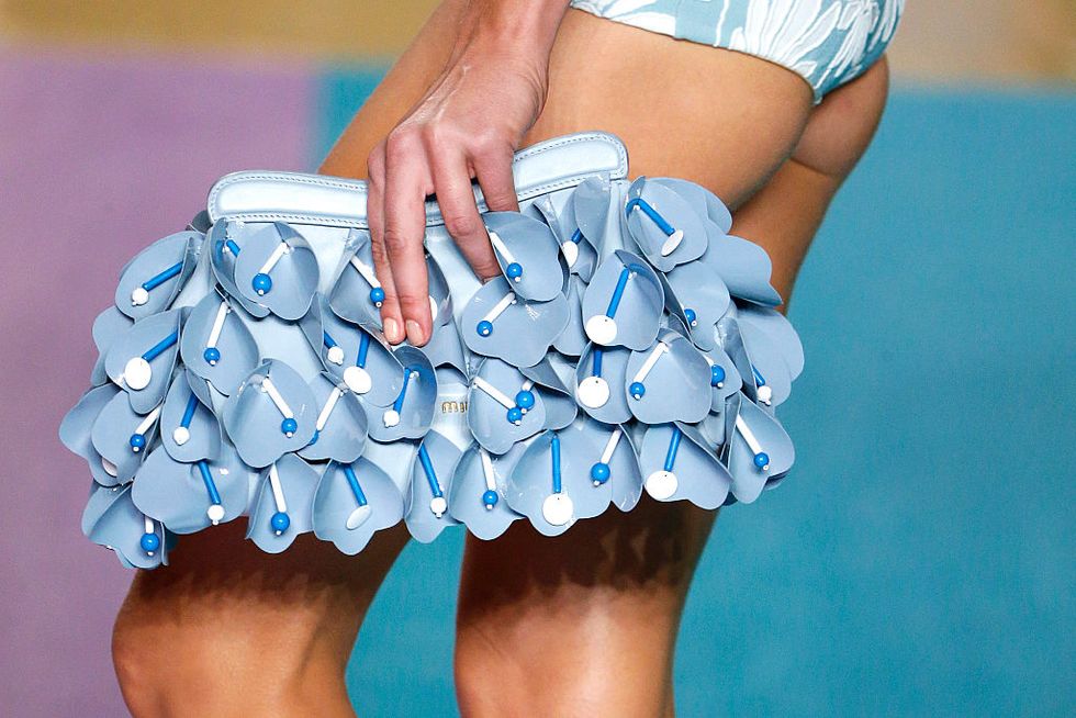 Blue, Joint, Cheerleading uniform, Electric blue, Thigh, Wrist, Aqua, Waist, Nail, Cheerleading, 