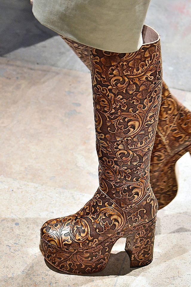 Brown, Boot, Beige, Bronze, Knee-high boot, Riding boot, Sculpture, Foot, Bronze, 
