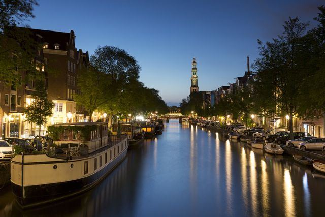 Body of water, Waterway, Reflection, Channel, Watercraft, Town, Tree, Canal, Watercourse, Boat, 