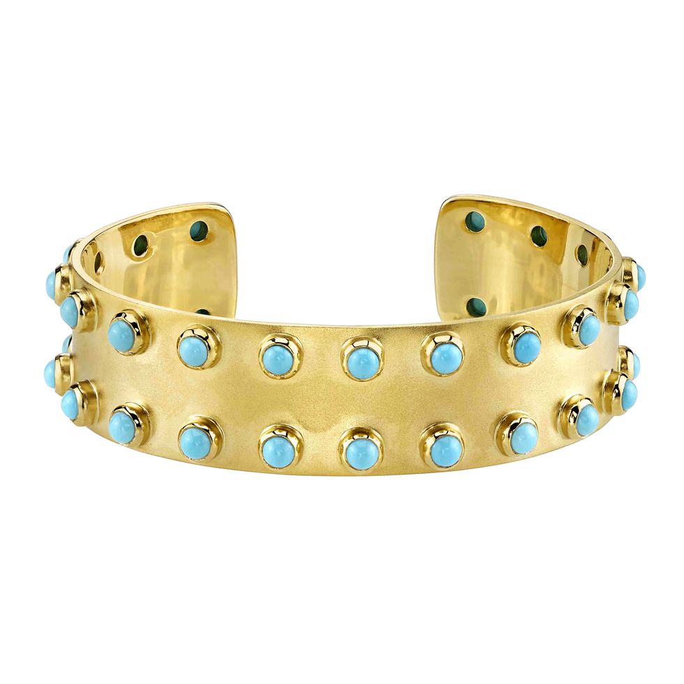 <p>
藍色寶石鑲嵌金色手環，價格電洽，Irene Neuwirth。</p>