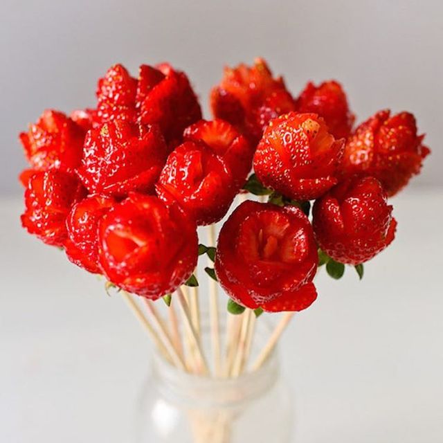 Red, Fruit, Produce, Natural foods, Still life photography, Berry, Ingredient, Vase, Cut flowers, Artifact, 