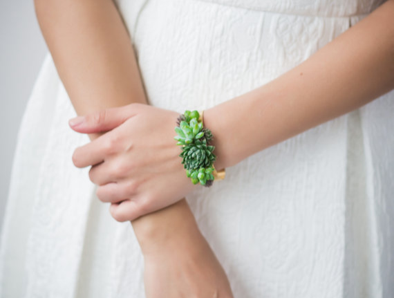 Green, Hand, Finger, Nail, Arm, Wrist, Leaf, Plant, Flower, Fashion accessory, 