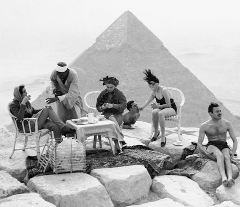 Pyramid, Tourism, Photography, Stock photography, Sitting, Black-and-white, History, Illustration, 
