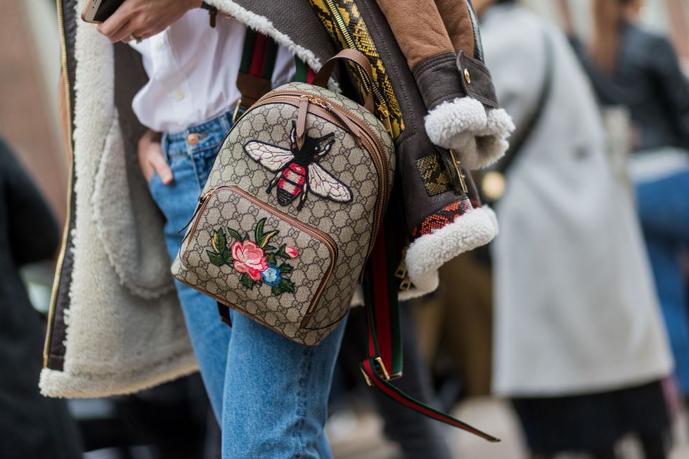 Street fashion, Tradition, Hand, Headgear, Textile, Fur, Style, 