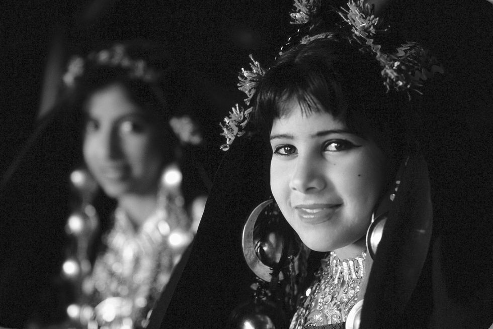 Face, Black, Photograph, People, Black-and-white, Monochrome, Monochrome photography, Headpiece, Eye, Smile, 