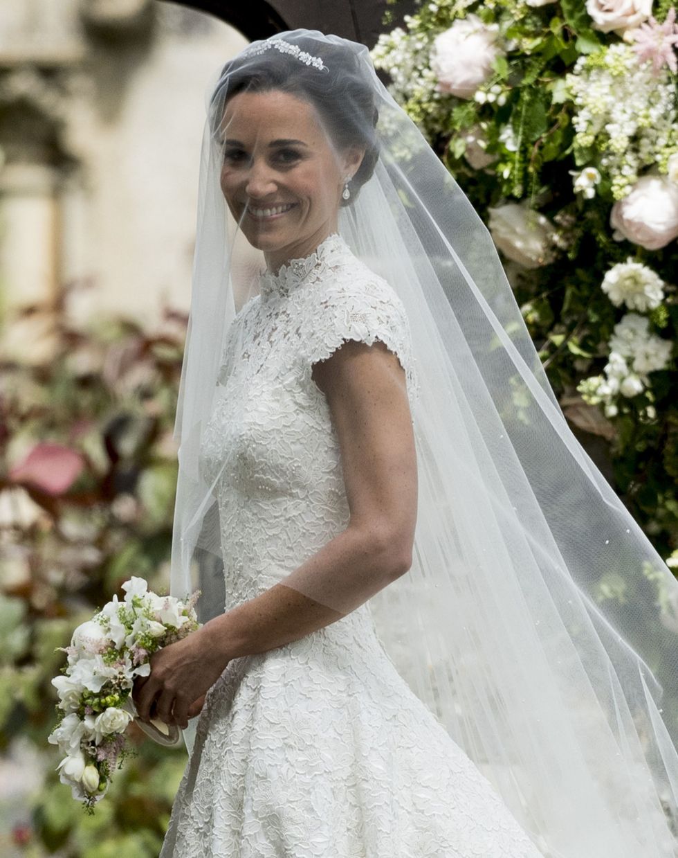 Bride, Wedding dress, Veil, Bridal veil, Bridal accessory, Gown, Dress, Photograph, Bridal clothing, Clothing, 