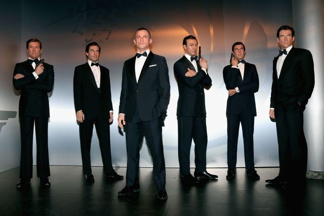 Suit, Formal wear, Social group, White-collar worker, Event, Tuxedo, Businessperson, Team, Business, Management, 