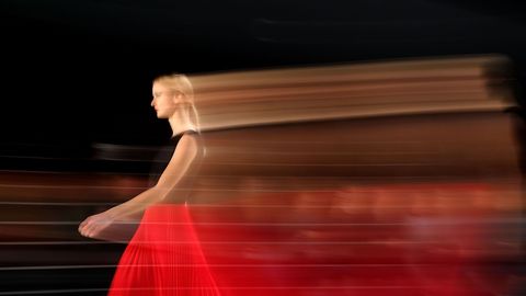 Red, Light, Dress, Human body, Hand, Photography, Wood, Night, Performance, Stage, 