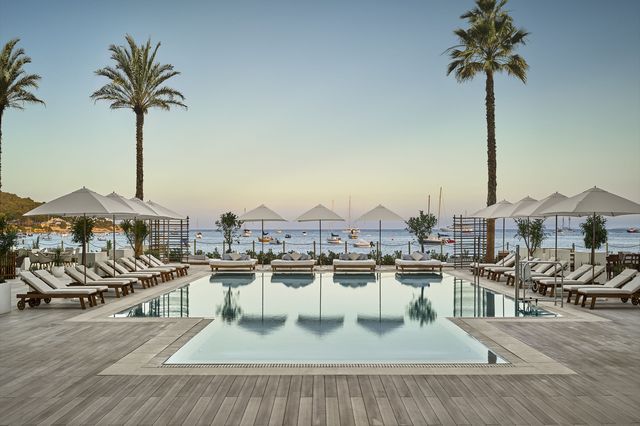 Resort, Swimming pool, Vacation, Palm tree, Tree, Hotel, Building, Architecture, Arecales, Leisure, 