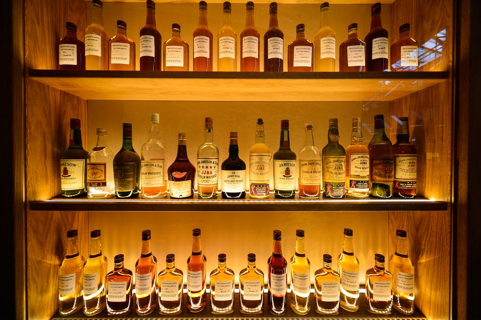 Alcohol, Liqueur, Distilled beverage, Bottle, Drink, Glass bottle, Bar, Wine bottle, Alcoholic beverage, Liquor store, 