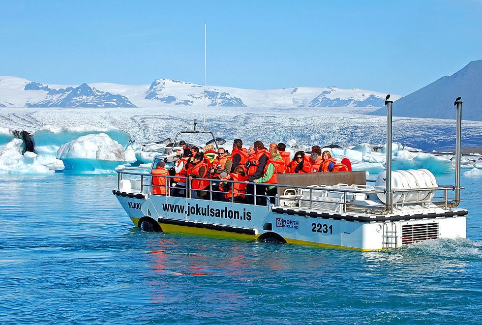 Water transportation, Vehicle, Boat, Ice, Natural environment, Arctic, Sea ice, Glacier, Tourism, Ocean, 