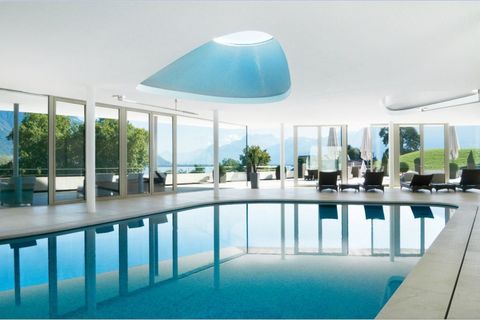 Swimming pool, Property, Real estate, Interior design, Ceiling, Light fixture, Resort, Aqua, Shade, Composite material, 