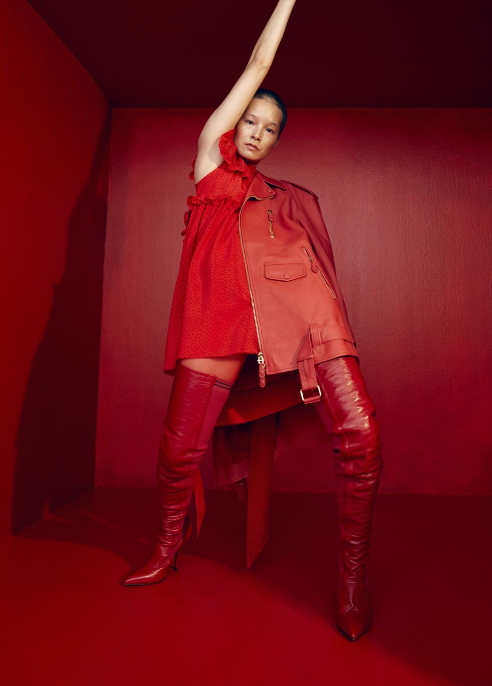 Red, Fashion, Outerwear, Photo shoot, Photography, Performance, Fashion design, Leather, Costume, Thigh, 