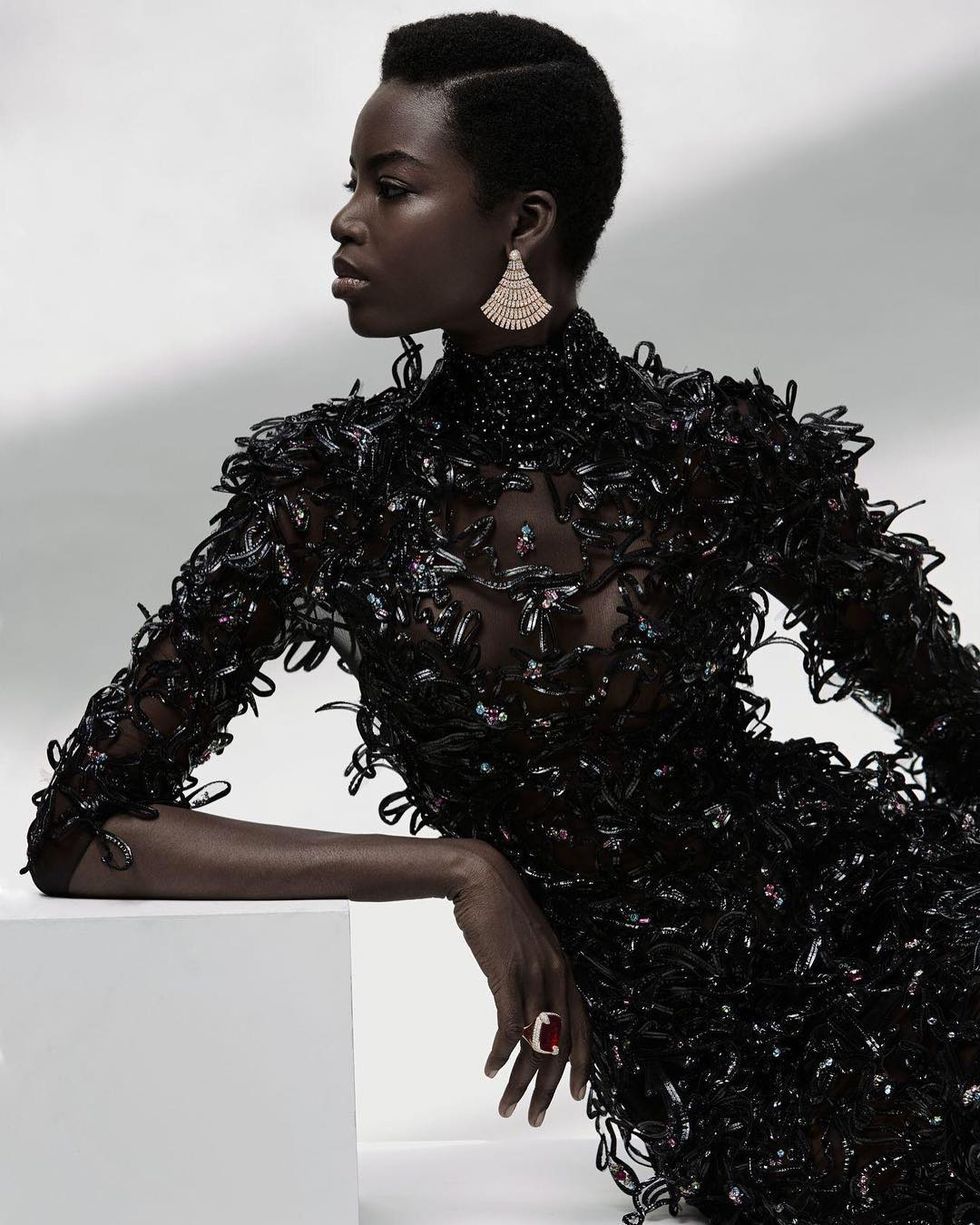 Fashion model, Black, Fashion, Clothing, Beauty, Dress, Model, Fashion design, Shoulder, Haute couture, 