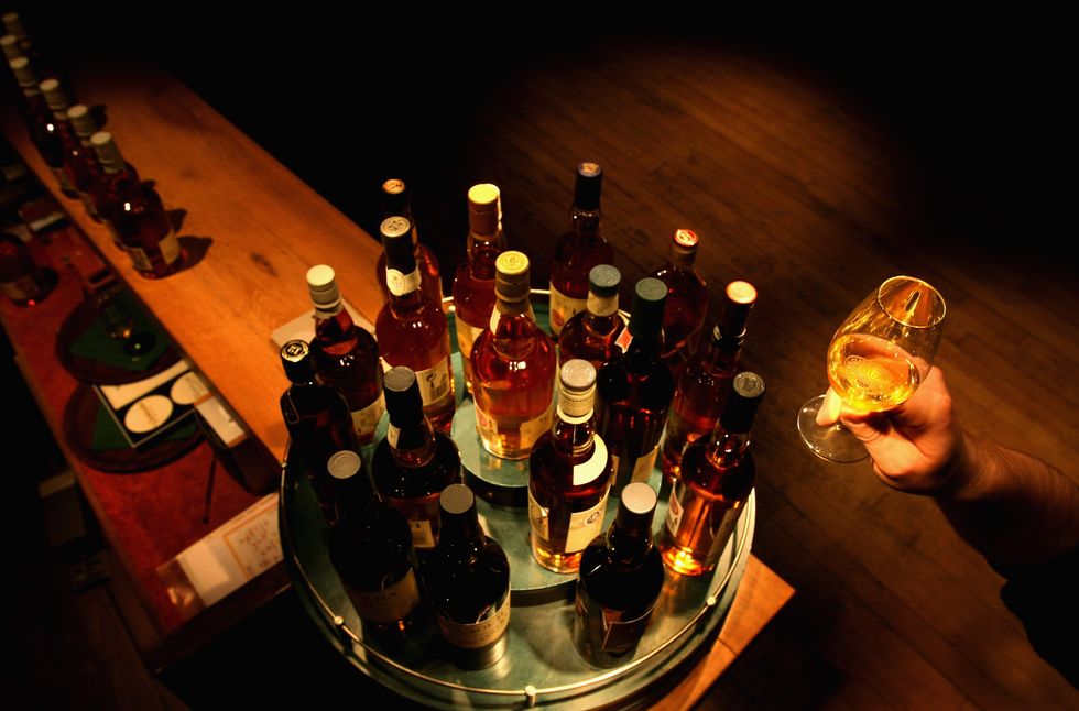 Alcohol, Drink, Bottle, Wine, Glass bottle, Alcoholic beverage, Wine bottle, Wine cellar, Bar, Distilled beverage, 