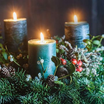 Candle, Lighting, Light, Christmas eve, Christmas, Christmas decoration, Evergreen, Branch, Interior design, Plant, 