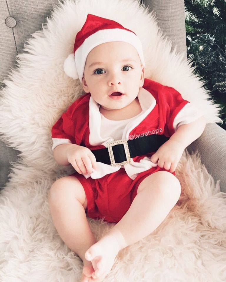 Child, Christmas, Toddler, Santa claus, Red, Fur, Baby, Skin, Christmas eve, Fictional character, 