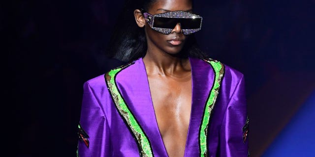 Fashion, Runway, Fashion show, Fashion model, Fashion design, Purple, Electric blue, Eyewear, Outerwear, Event, 