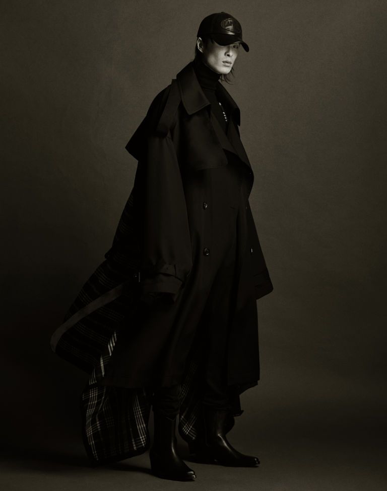 Black, Standing, Outerwear, Fashion, Costume, Fashion design, Gothic fashion, Fictional character, Mantle, Cloak, 