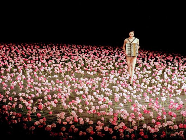 People, Crowd, Audience, Performance, Pink, Event, Flower, Plant, Performance art, Font, 