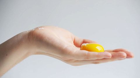 Egg yolk, Skin, Hand, Yellow, Finger, Egg, Egg, Nail, Egg white, Food, 