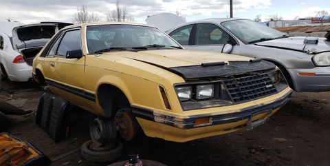 1982 ford mustang in colorado junkyard