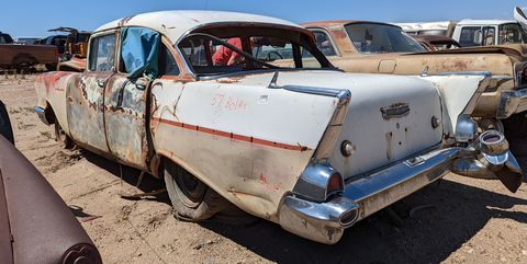 1957 chevrolet 150 sedan in wyoming junkyard