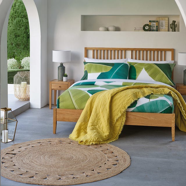 Furniture, Bedroom, Bed, Room, Bed frame, Green, Bed sheet, Bedding, Property, Yellow, 