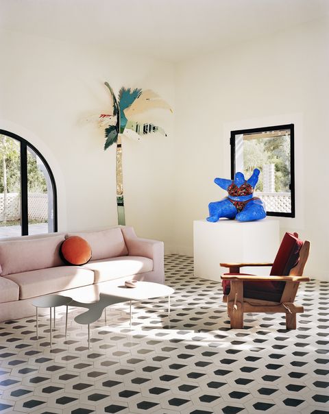 colourful living room by india mahdavi, featuring her ‘rain’ tiles for bisazza and a pink ‘jetlag’ sofa