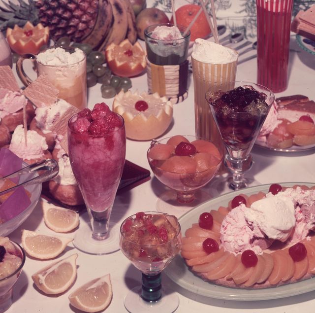 circa 1960  fresh grapefruit, summer fruits and ice cream sundaes for the sweet toothed  photo by chaloner woodsgetty images