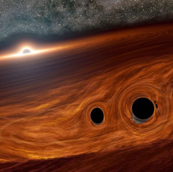 two black holes collide in accretionary disk around supermassive black hole